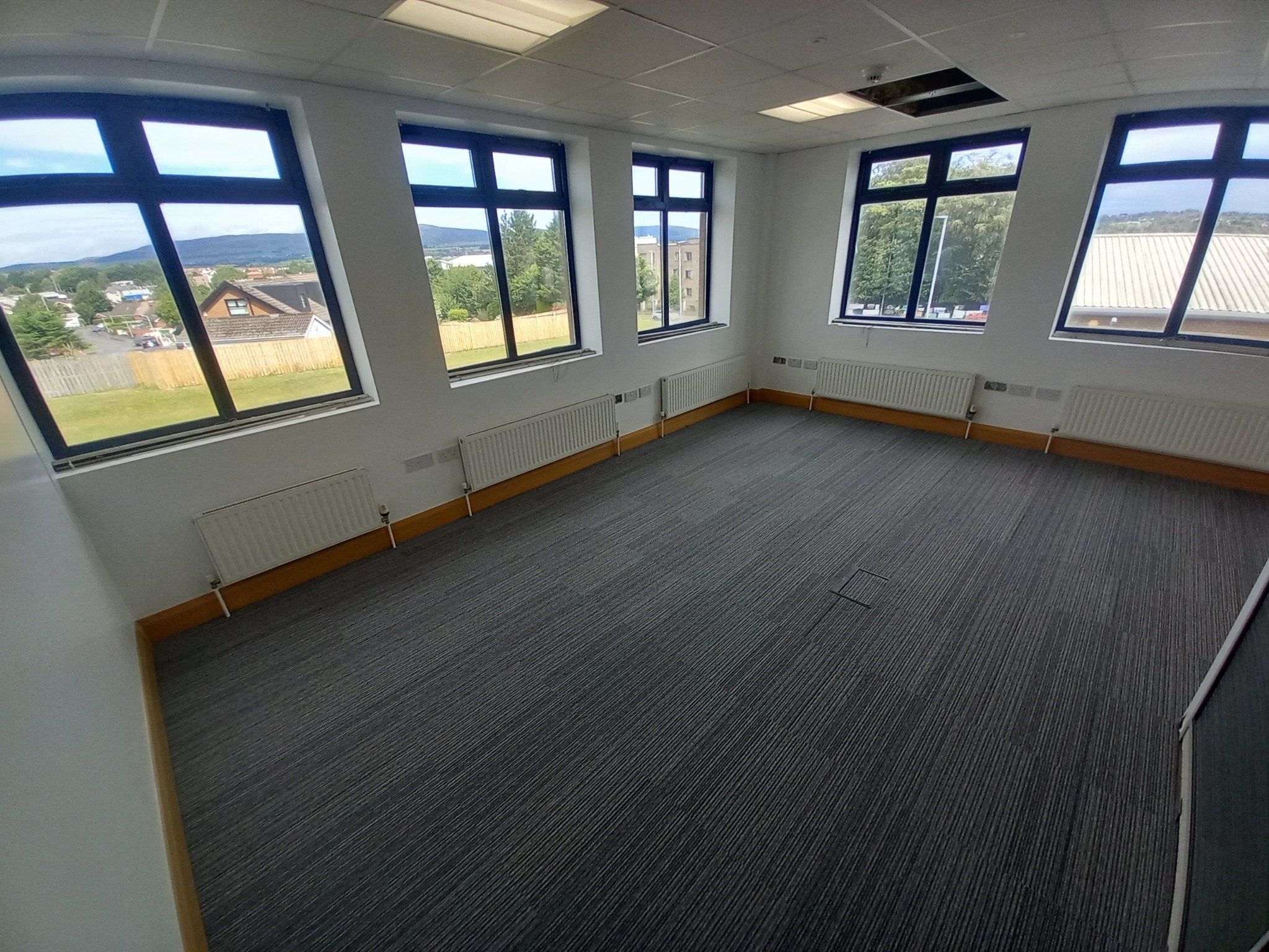 Bright Suite 6 office with views across Derry
